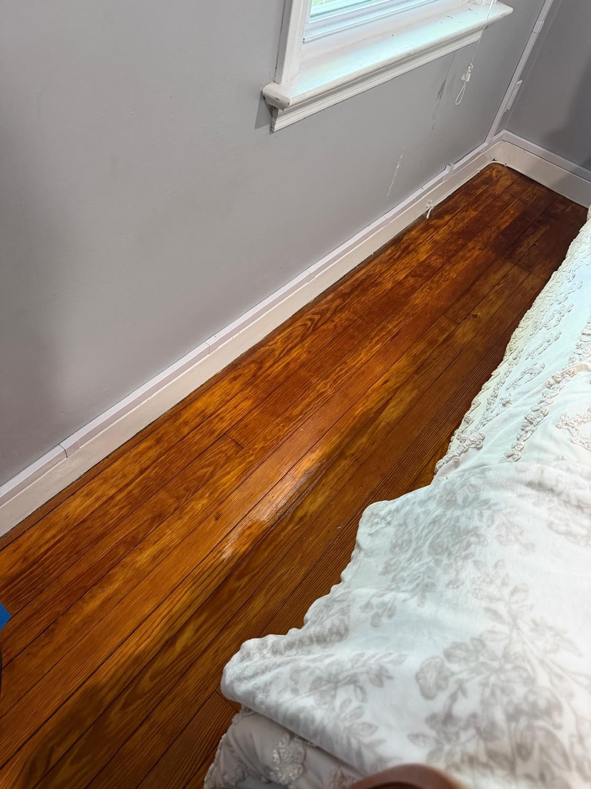 Bedroom floor along the bed line — after