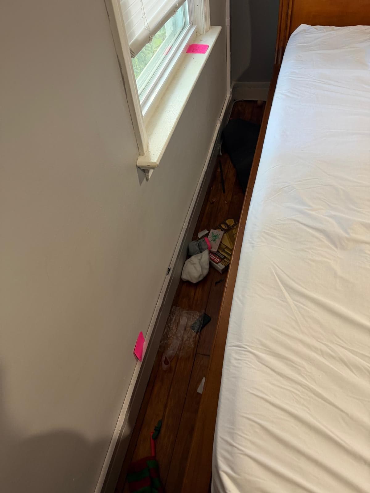 Bedroom floor along the bed line — before
